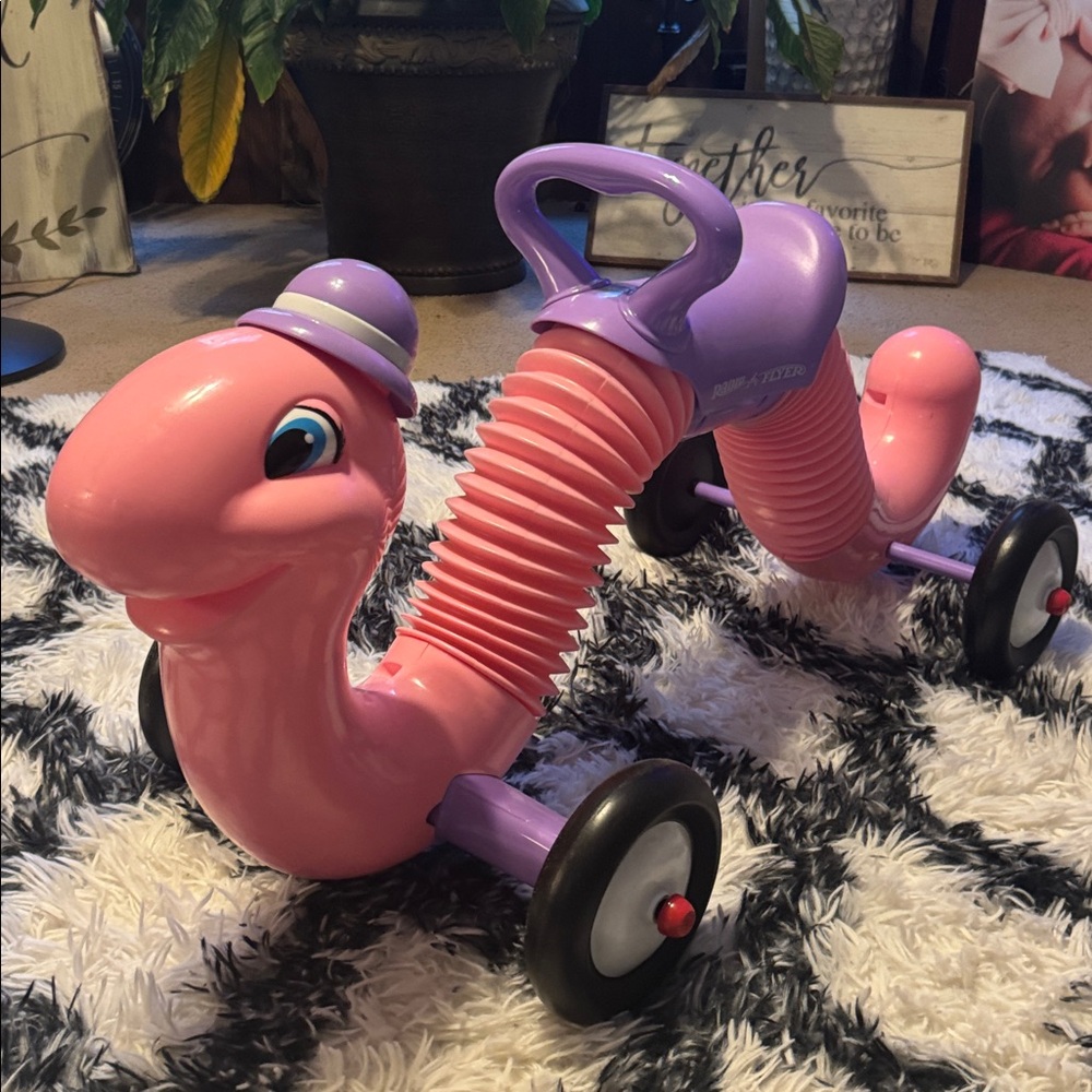 Pink and Purple Ride-On Worm Toy in perfect condition. Like new